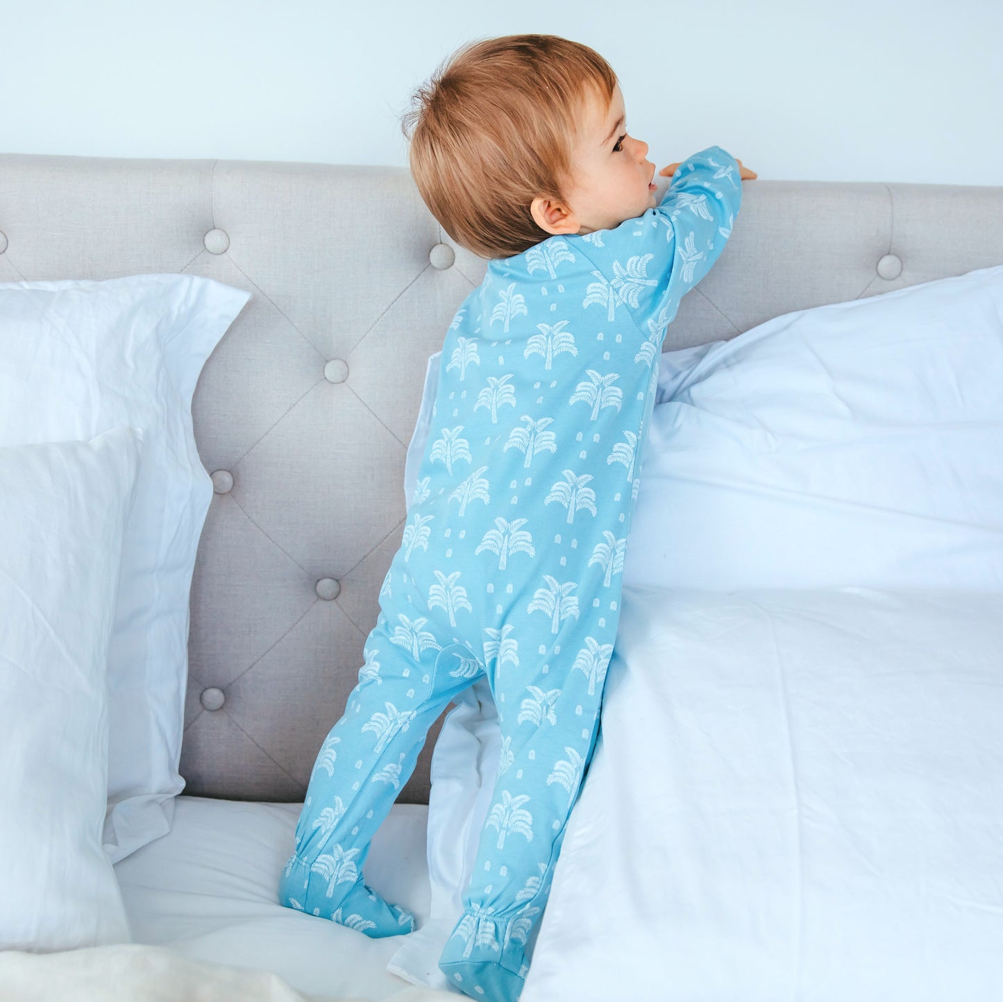 Organic Cotton Crossover Baby Onesie Sleepsuit with Feet in Aquatic Blue Palms and Pineapples