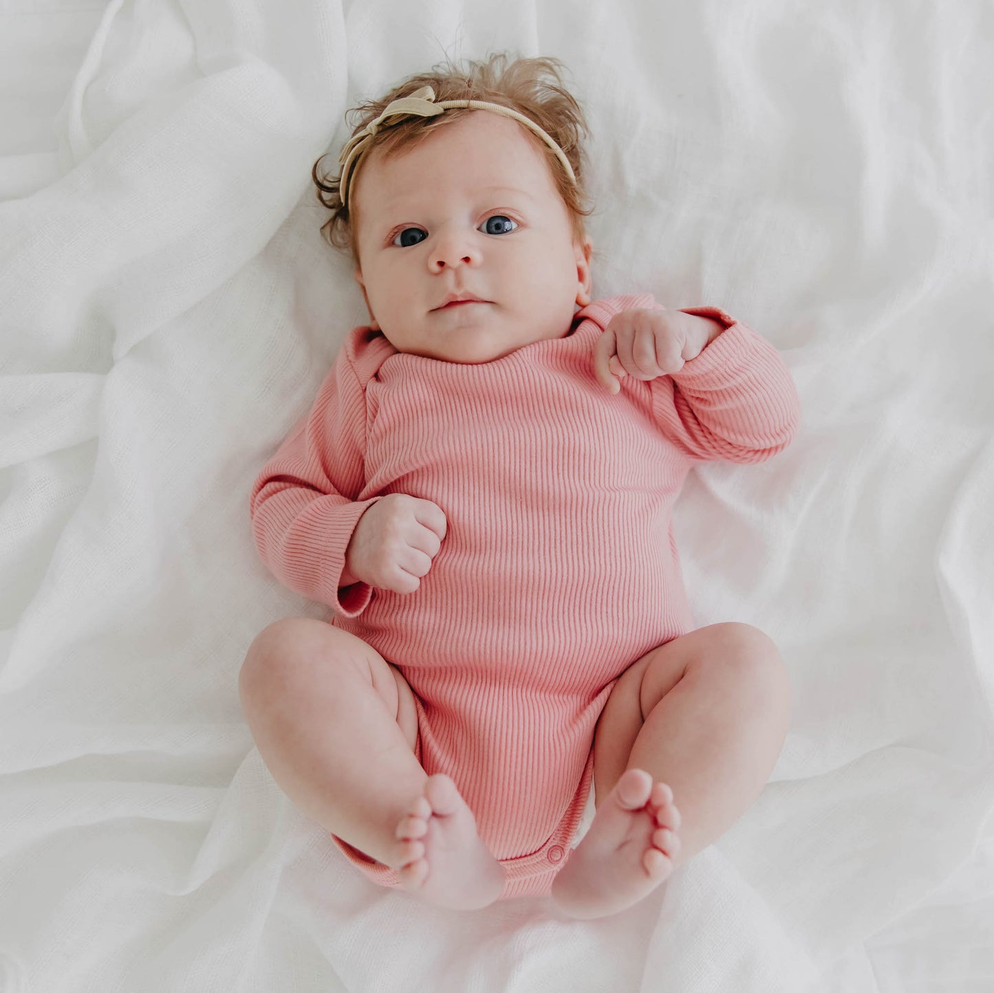 Certified Organic Cotton Rib Knit Baby Onesie Sleepsuit with Long Arms in Pink